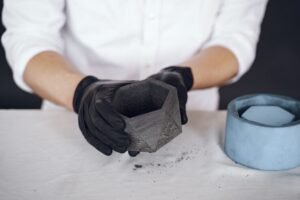 man-white-shirt-works-with-cement