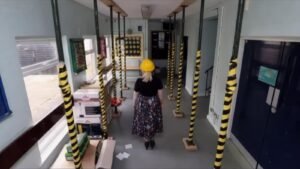 Expert structural engineer conducting comprehensive RAAC concrete assessment in school building - advanced non-destructive testing techniques identifying hidden concrete defects and safety